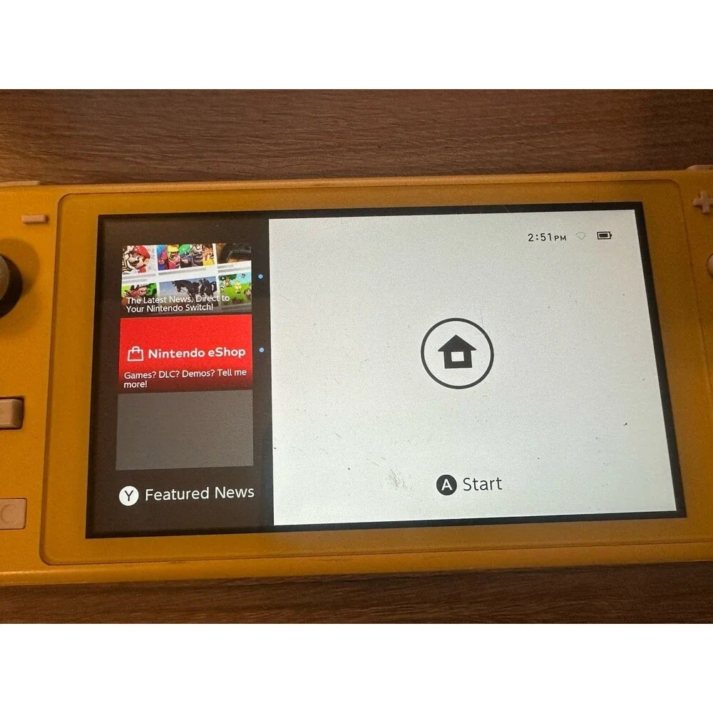 Nintendo Switch Lite Yellow Handheld Console Tested Works w/ microSD Card